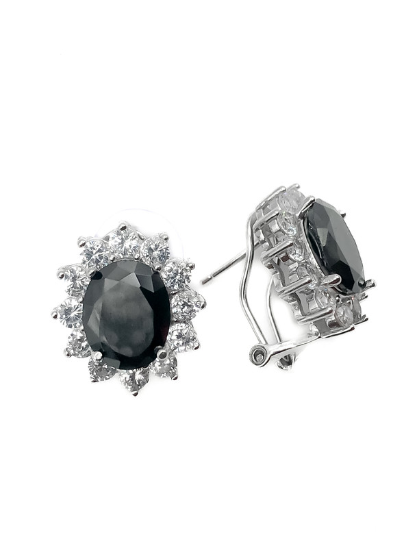 Aretes plata tipo flor con piedra oval negra broche omega