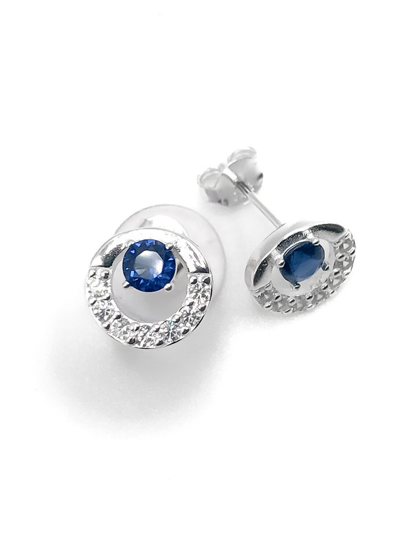 Aretes plata circulo de piedras blancas con piedra interna azul