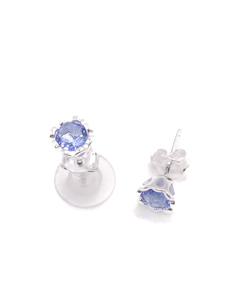 Aretes plata circon en base de flor celeste