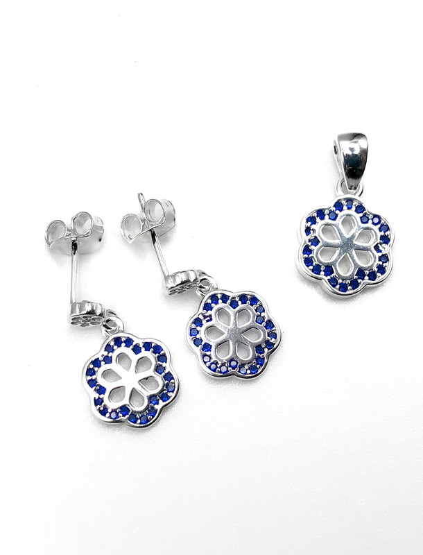 Juegos plata flor circon azul a presion