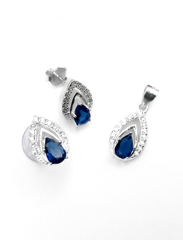 Juegos plata gota con circon azul central a presion