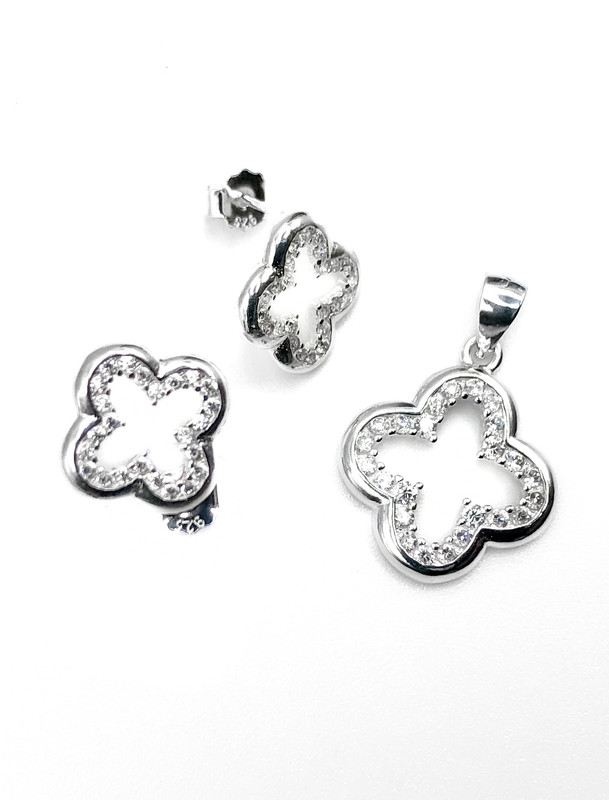 Juegos plata flor bisel circon blanco a presion