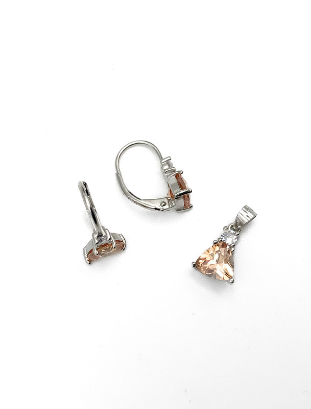 Juegos plata triangulo piedra naranja a presion