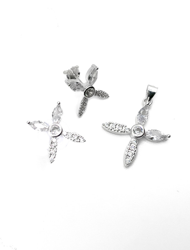 Juegos plata cruz circon blanco central a presion