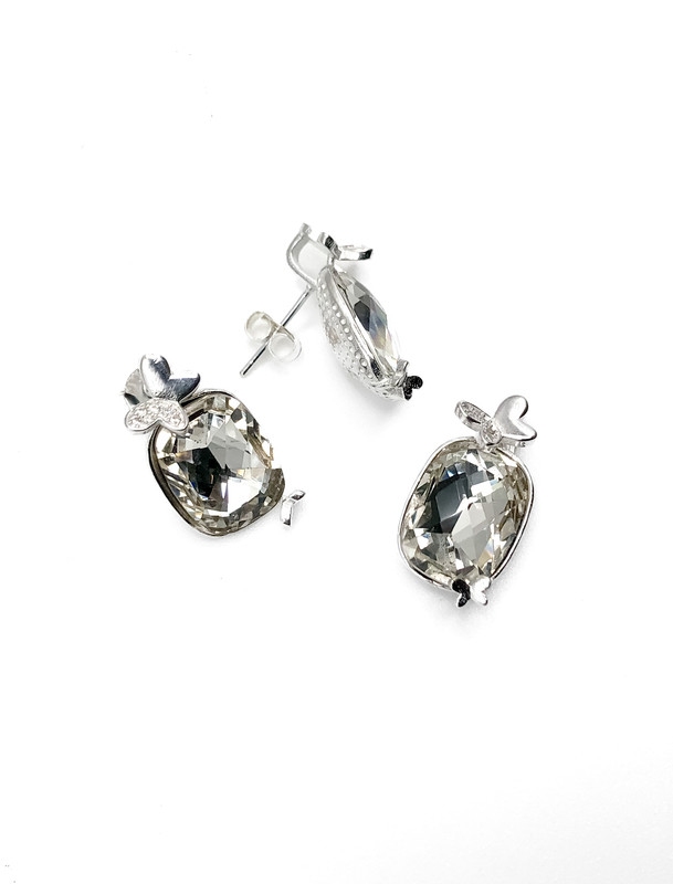 Juegos plata oval piedra blanca mariposa lisa a presion